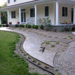 Stamped Concrete winding sidewalk at a new home in the country